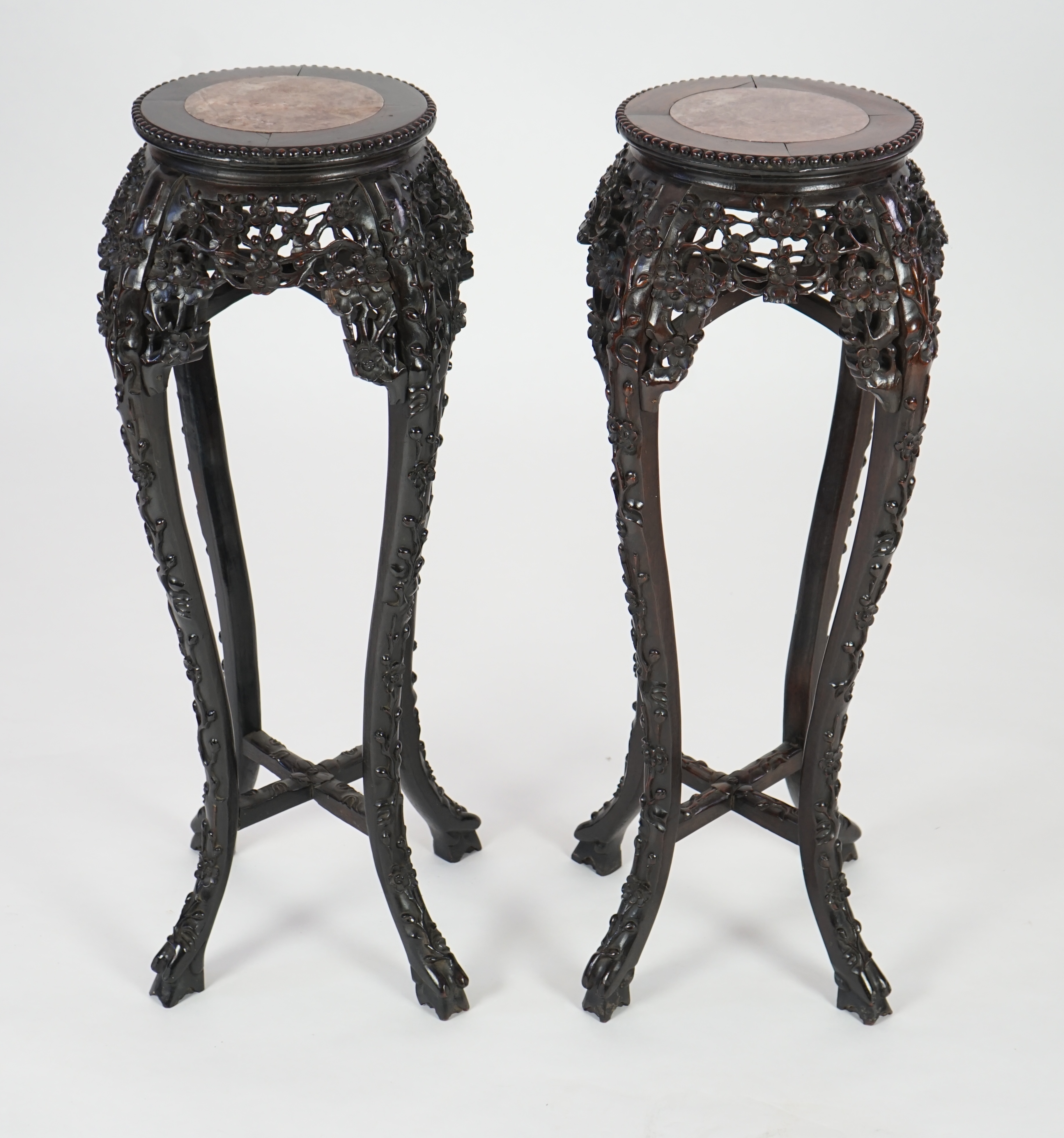 A pair of late 19th century Chinese hongmu and marble inset vase stands, height 91cm. Condition - fair to good